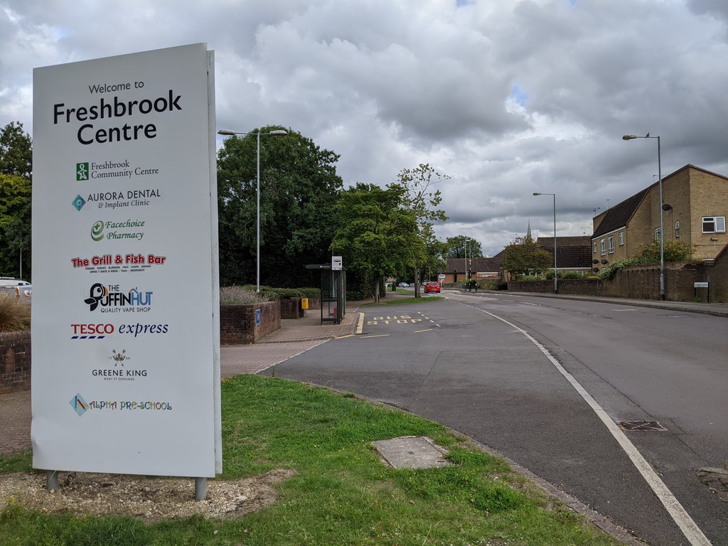 Entrance to Freshbrook Centre and a bus stop